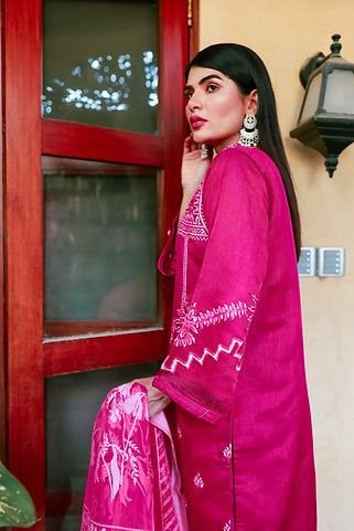 Elegant Pink Dress with White Embroidery